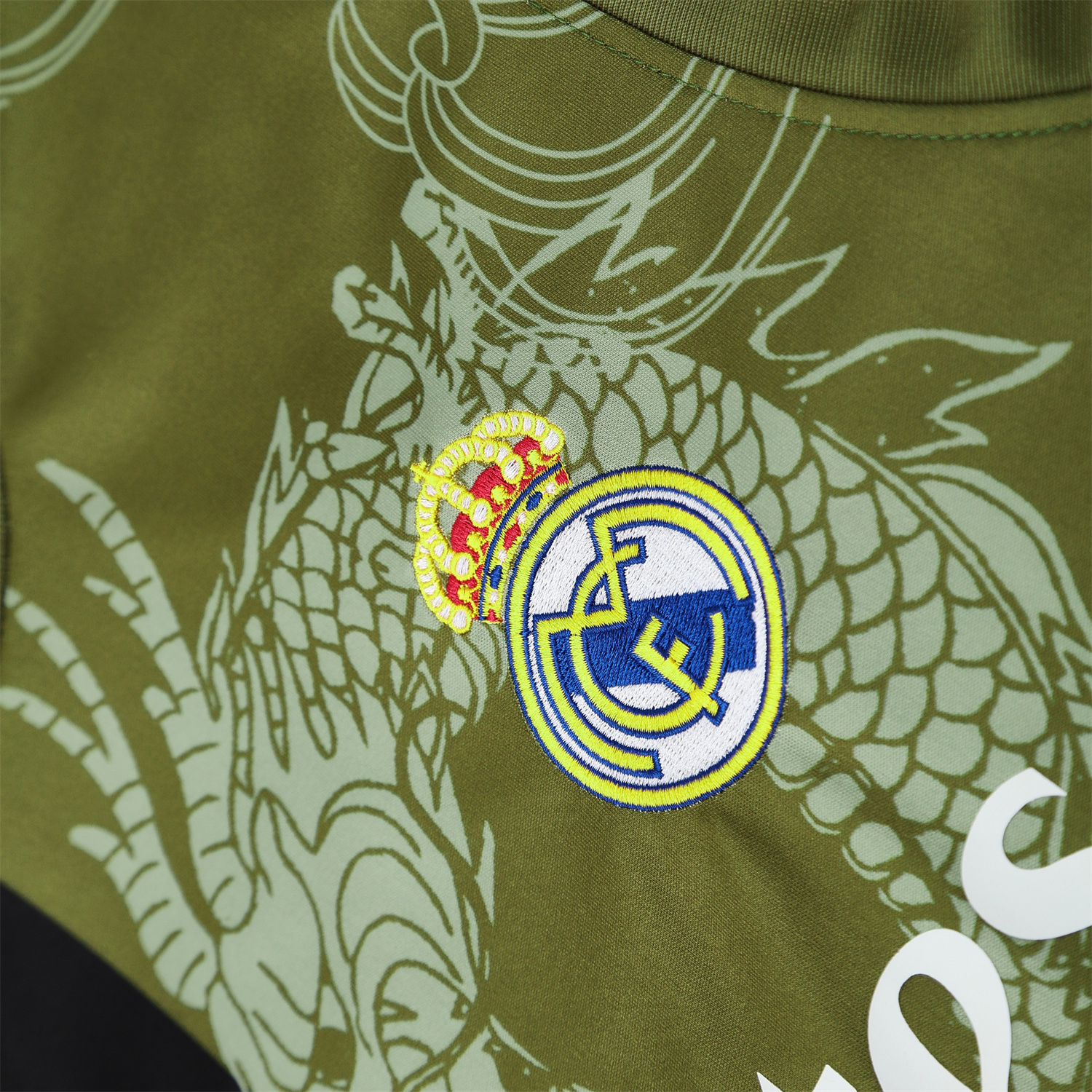 TFK-turbofussballkit-Real Madrid 25-26 Vest Training Set - Green-Black Dragon Vest & Black-White Shorts