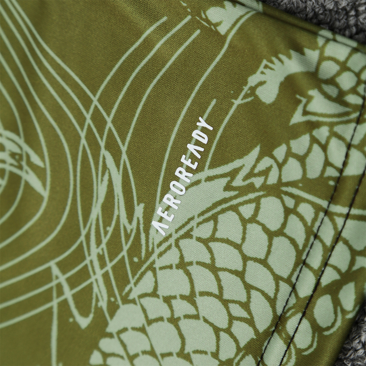 TFK-turbofussballkit-Real Madrid 25-26 Vest Training Set - Green-Black Dragon Vest & Black-White Shorts