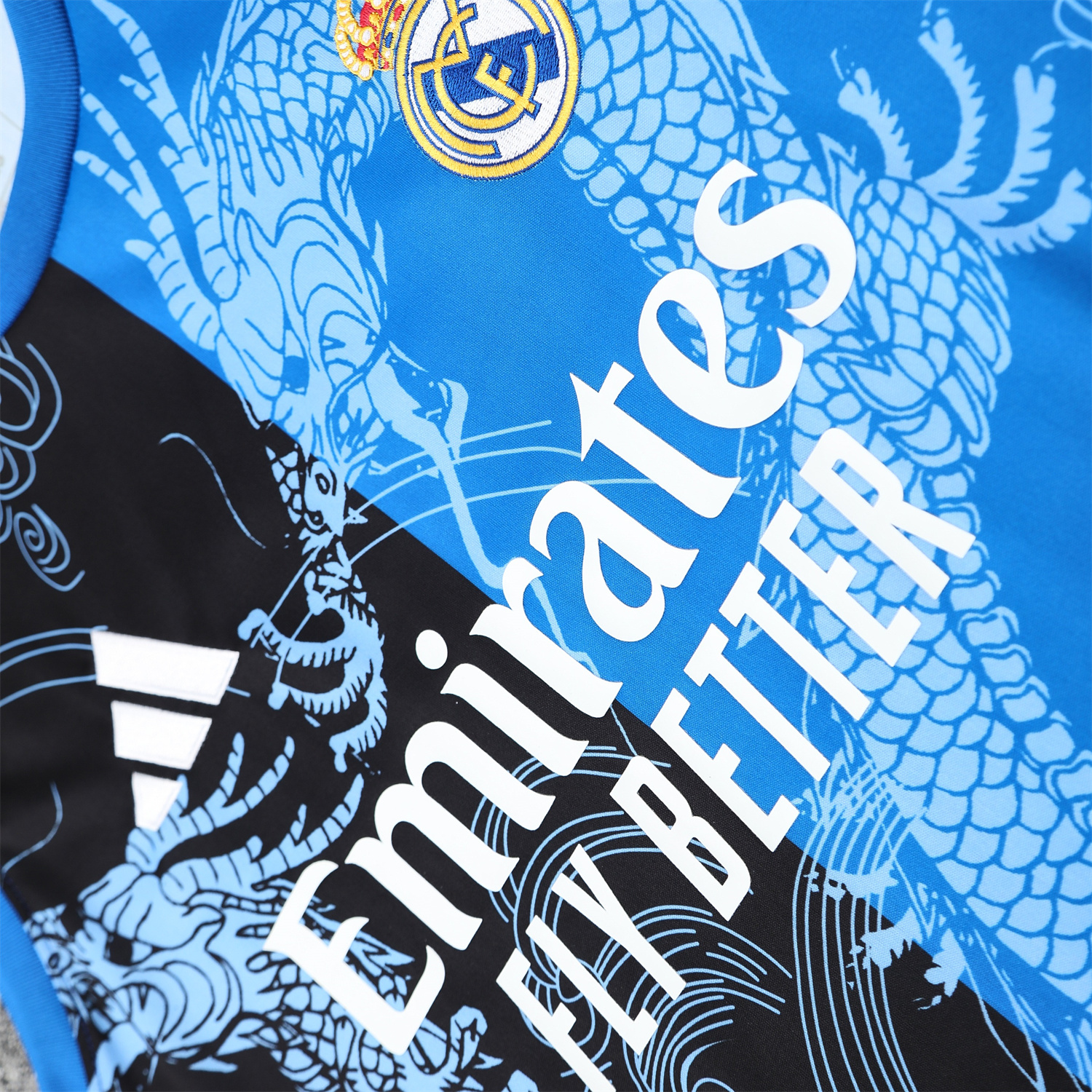 TFK-turbofussballkit-Real Madrid 25-26 Vest Training Set - Blue Black Dragon Vest & Black-White Shorts