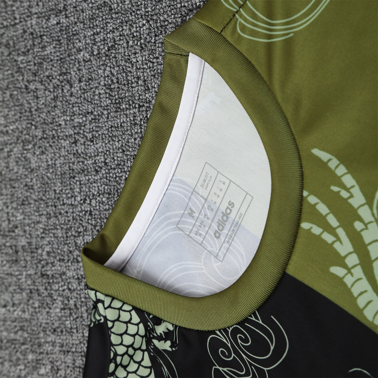 TFK-turbofussballkit-Real Madrid 25-26 Vest Training Set - Green-Black Dragon Vest & Black-White Shorts